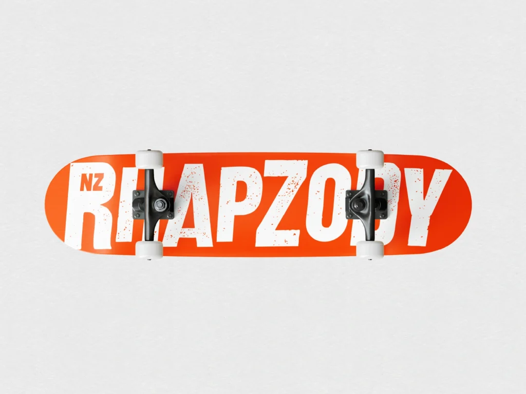 NZ Rhapzody brand logo printed on the underside of a skateboard deck.