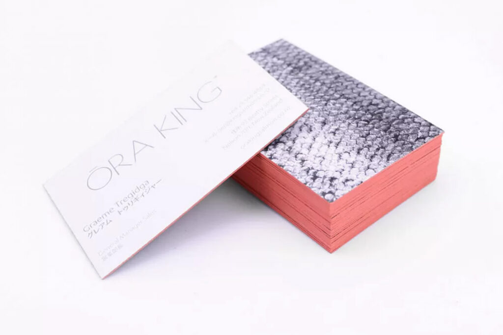Ōra King business cards which look like salmon skin