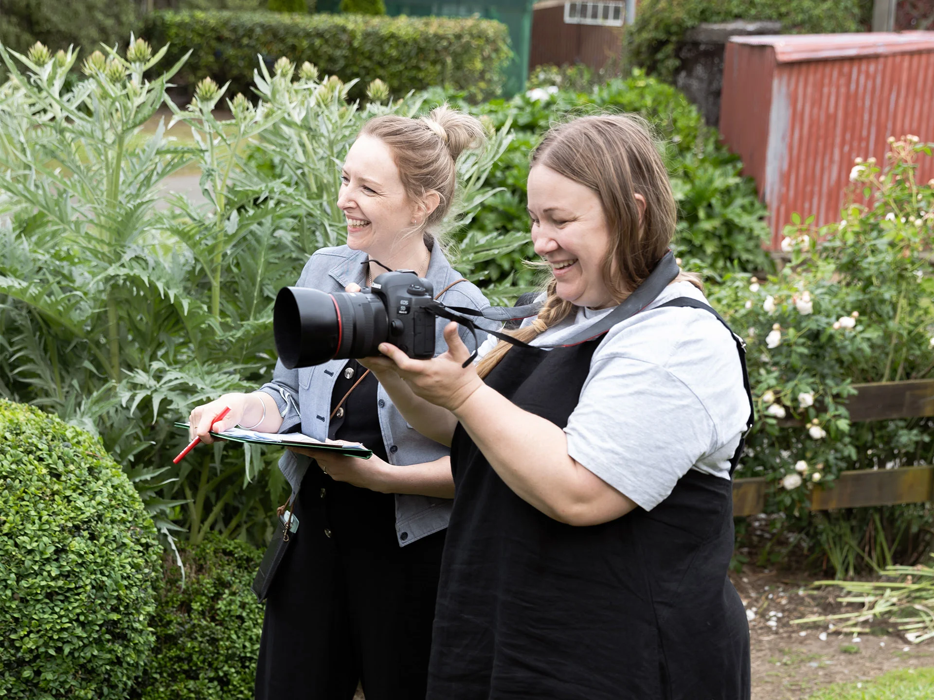 Two women enjoying a photography session.