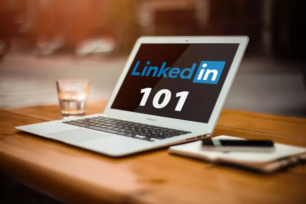Laptop displaying LinkedIn 101 tutorial for businesses