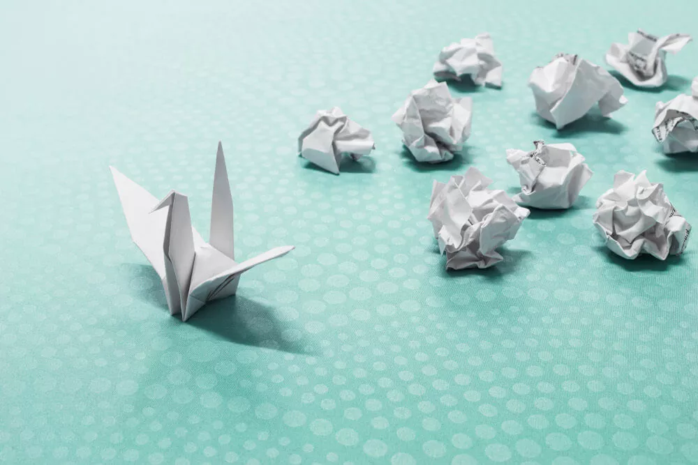 A/B split testing diagram comparing landing page conversion rates through origami
