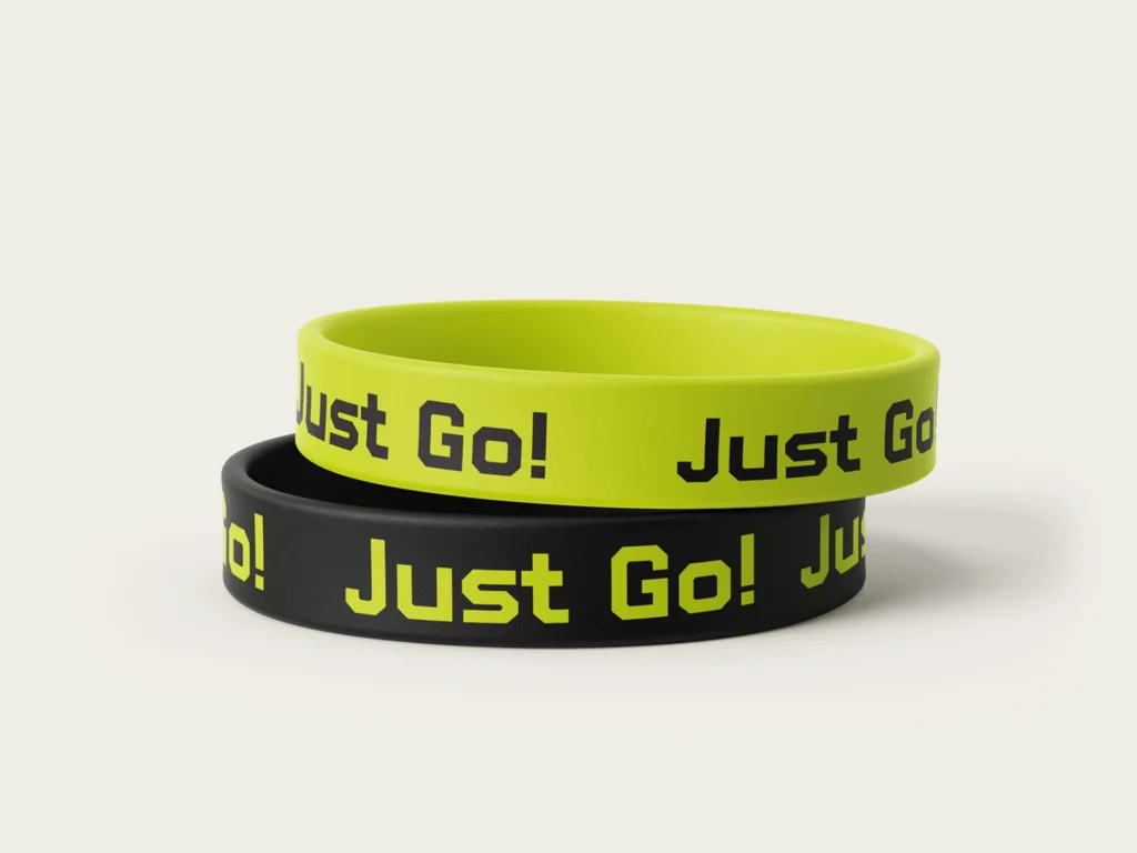 Two wristbands with motivational text.