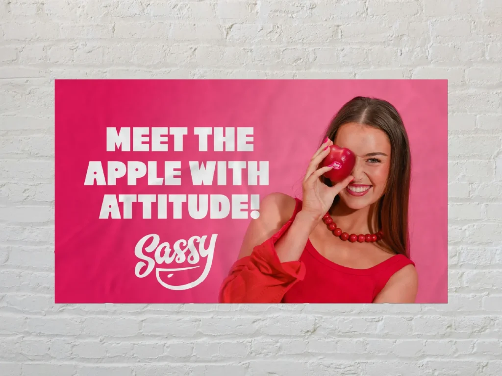 Woman holding apple with playful expression