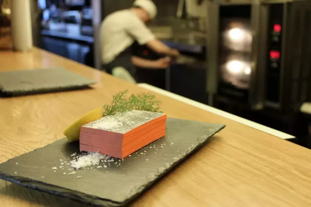 Award winning luxury salmon skin tactile business card design for Ōra King