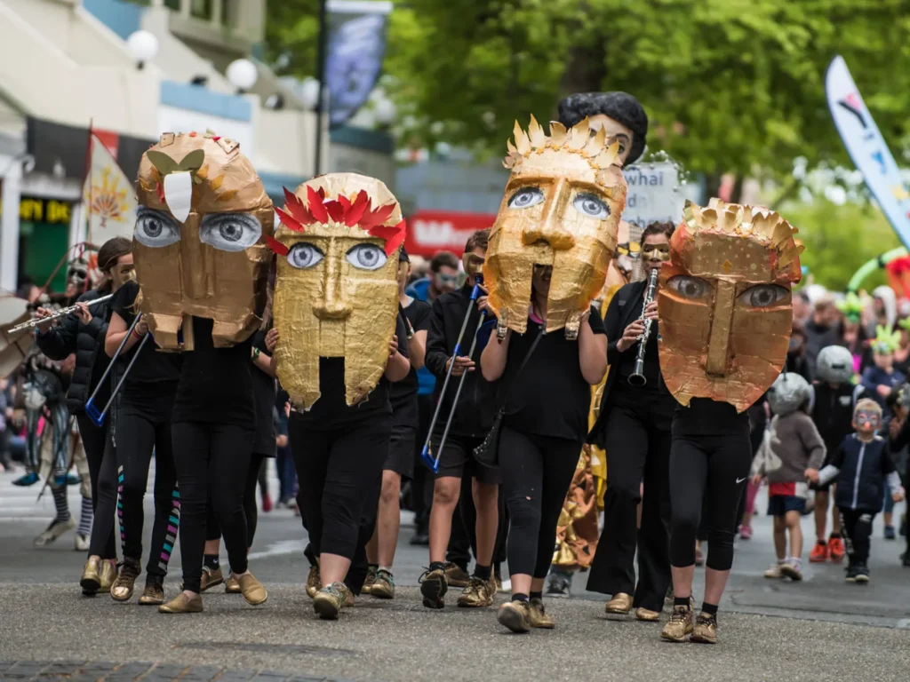 street performers in nelson masque parade as part of the Arts Festival