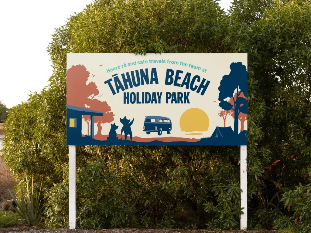 Tāhuna Beach Holiday Park brand and illustrations on park sign