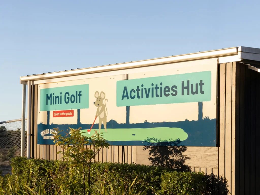 Downing's branded illustrations on Holiday Park signs
